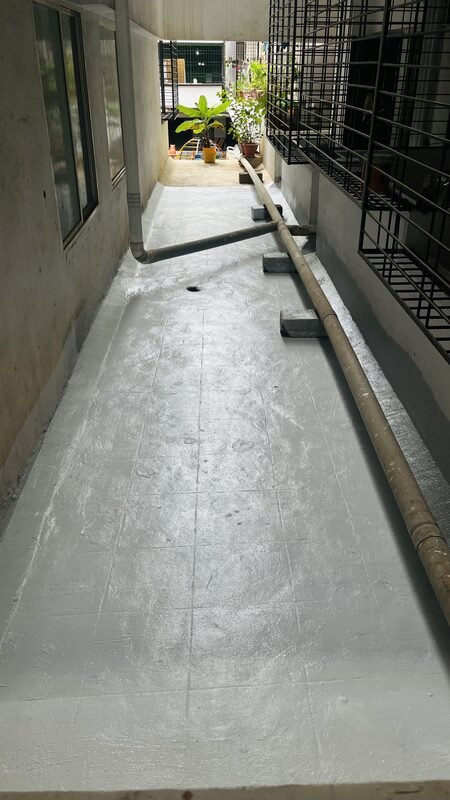 Completed waterproofing: exterior passage fully sealed with polymer coating