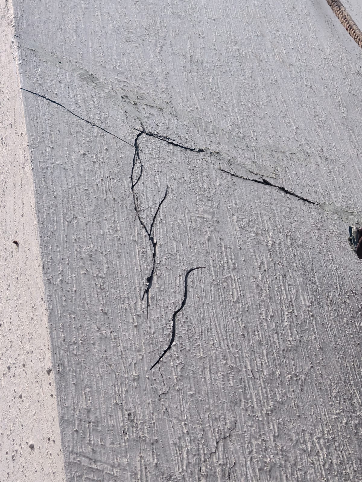 Exterior wall cracks at Kannamangala villa before waterproofing