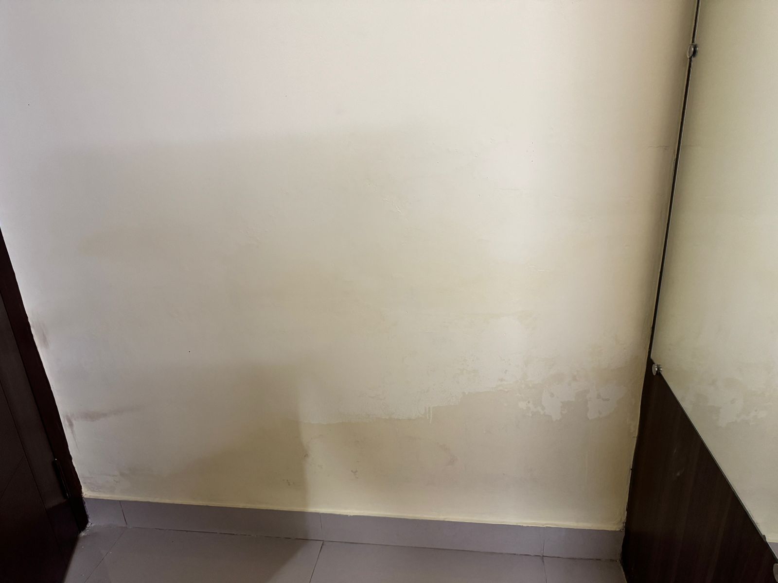 Bathroom wall seepage and rising damp at Chikkadunnasandra