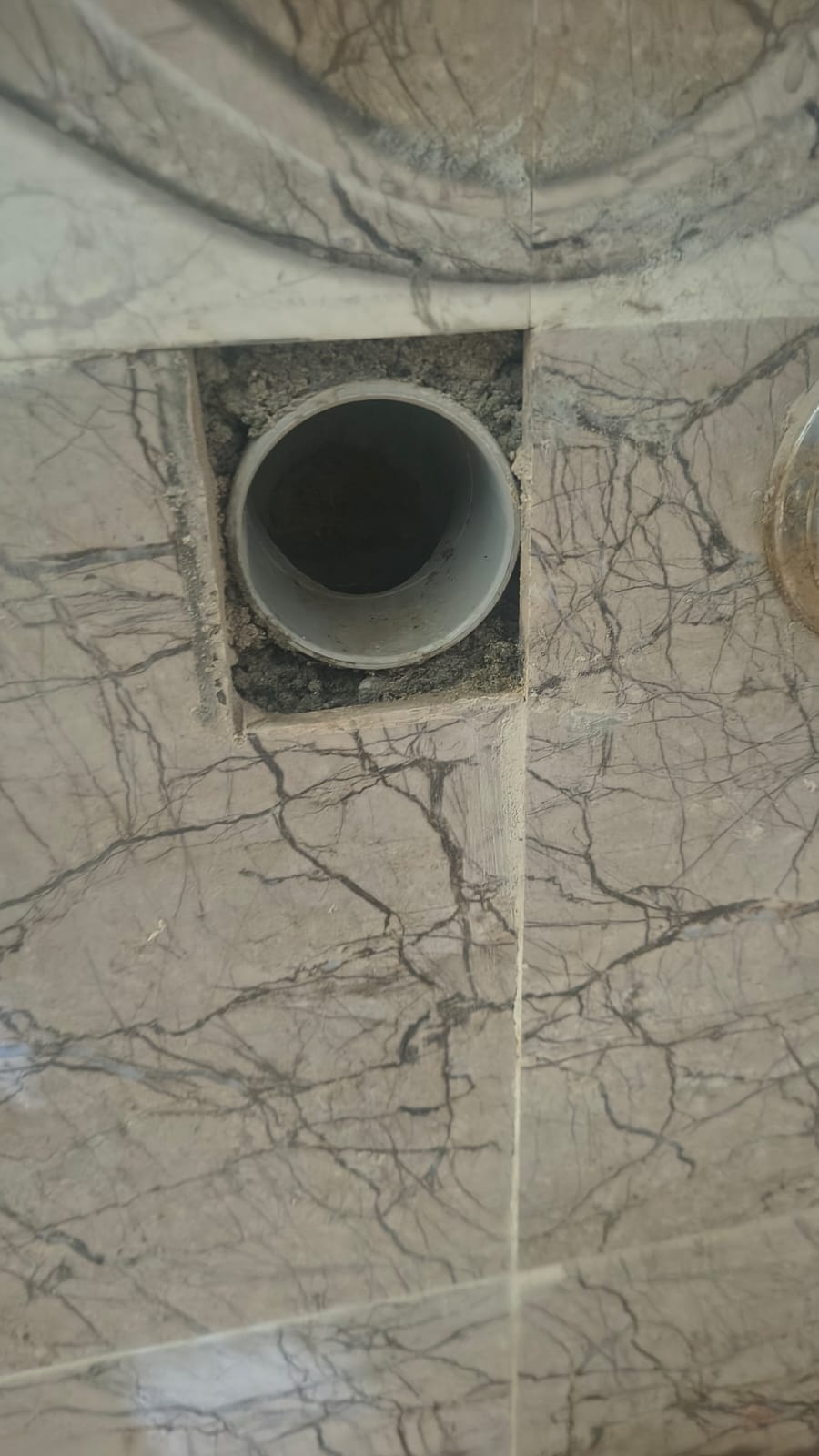 Blocked kitchen drain with sediment buildup